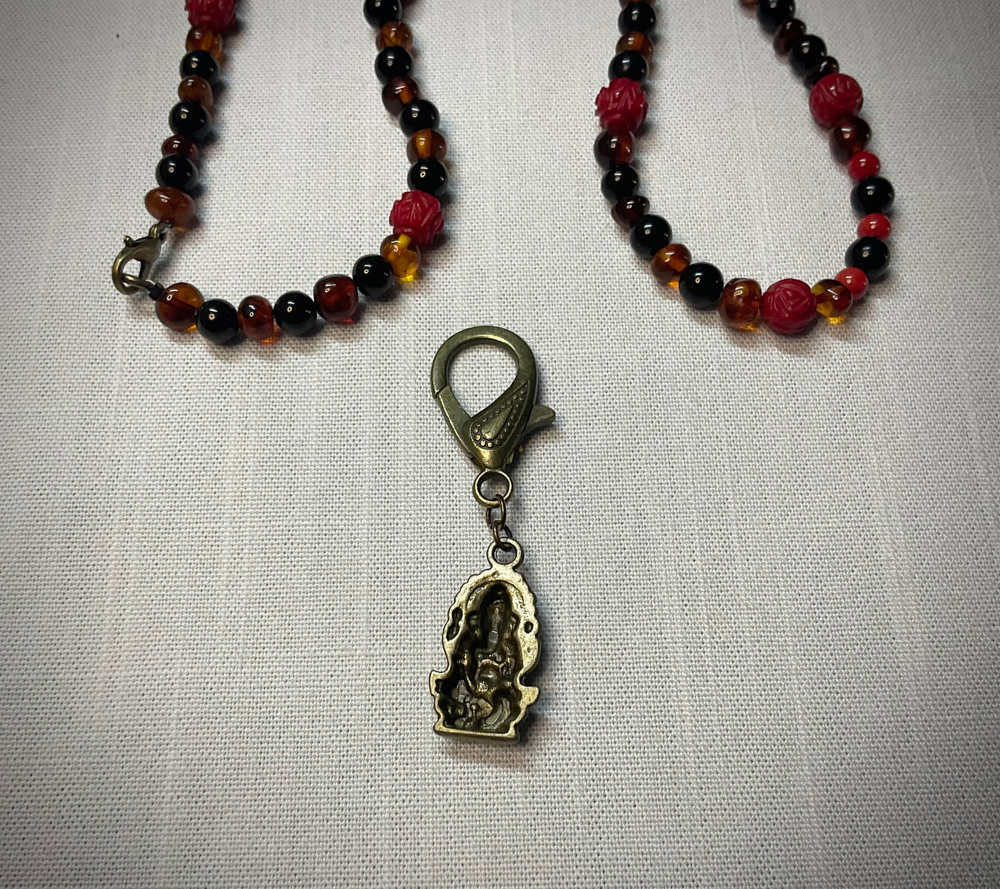 Lord Ganesha Amber Jet and Red Coral Talisman