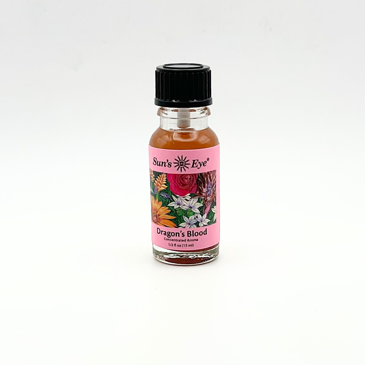 Bottle of 'Dragon's Blood' Oil from Suns Eye with a colorful label on a white background