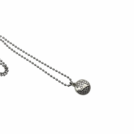 Silver tone necklace with a spherical earth globe pendant on a white background