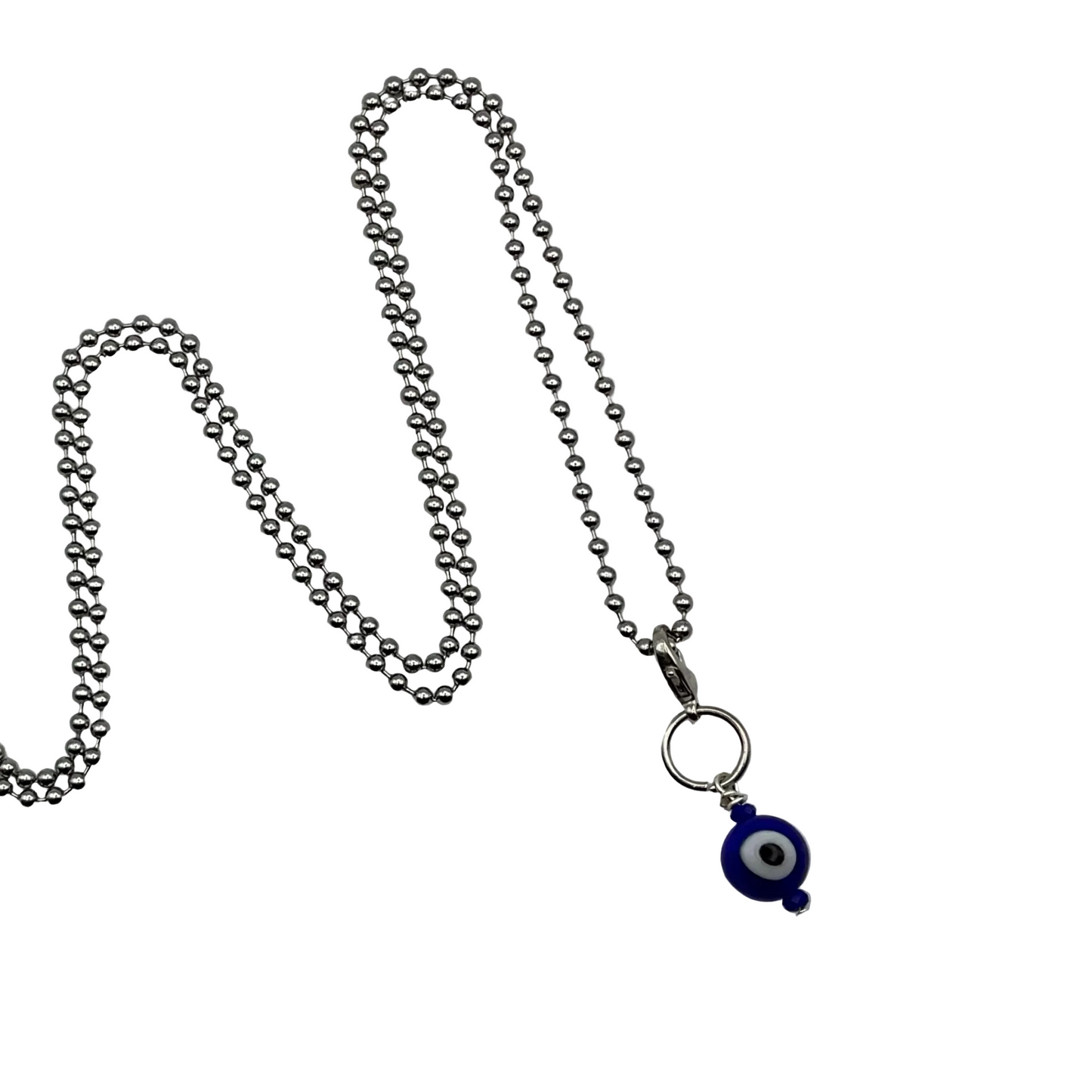 Silver tone ball chain necklace with a blue evil eye charm on a white background