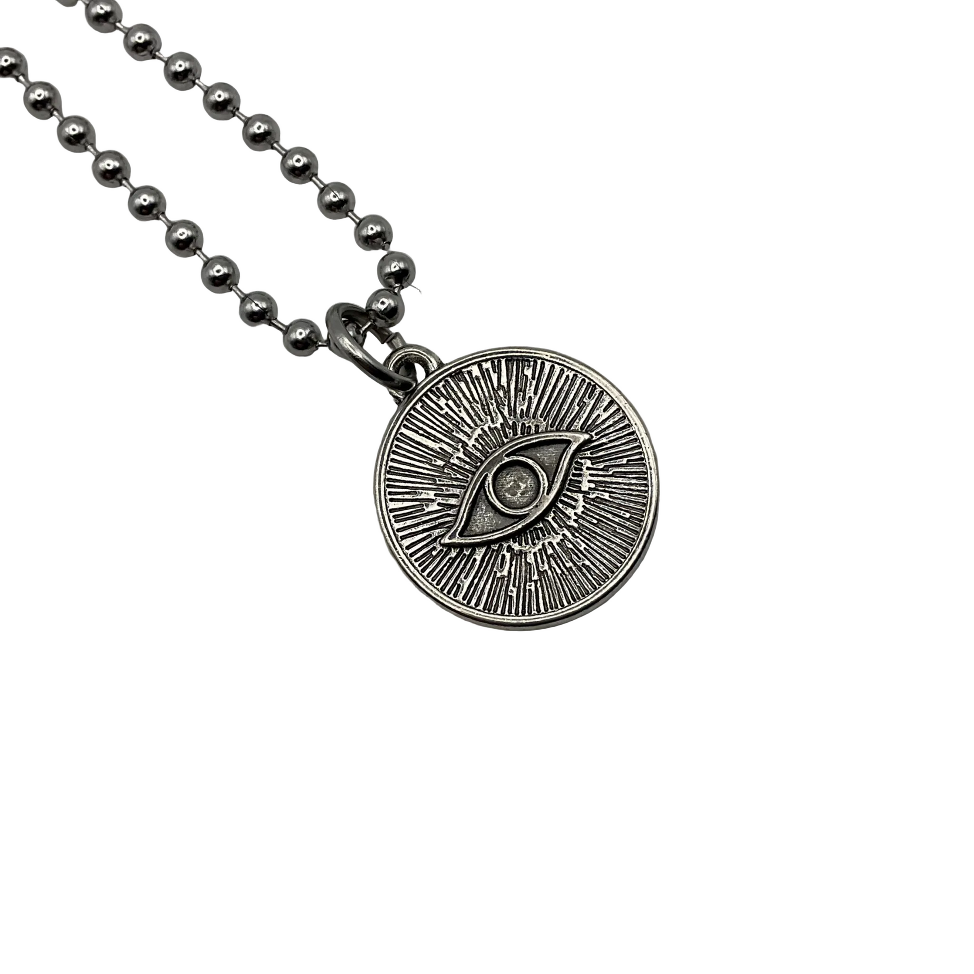 The all seeing eye symbol on a charm on a ball chain necklace displayed against a white background