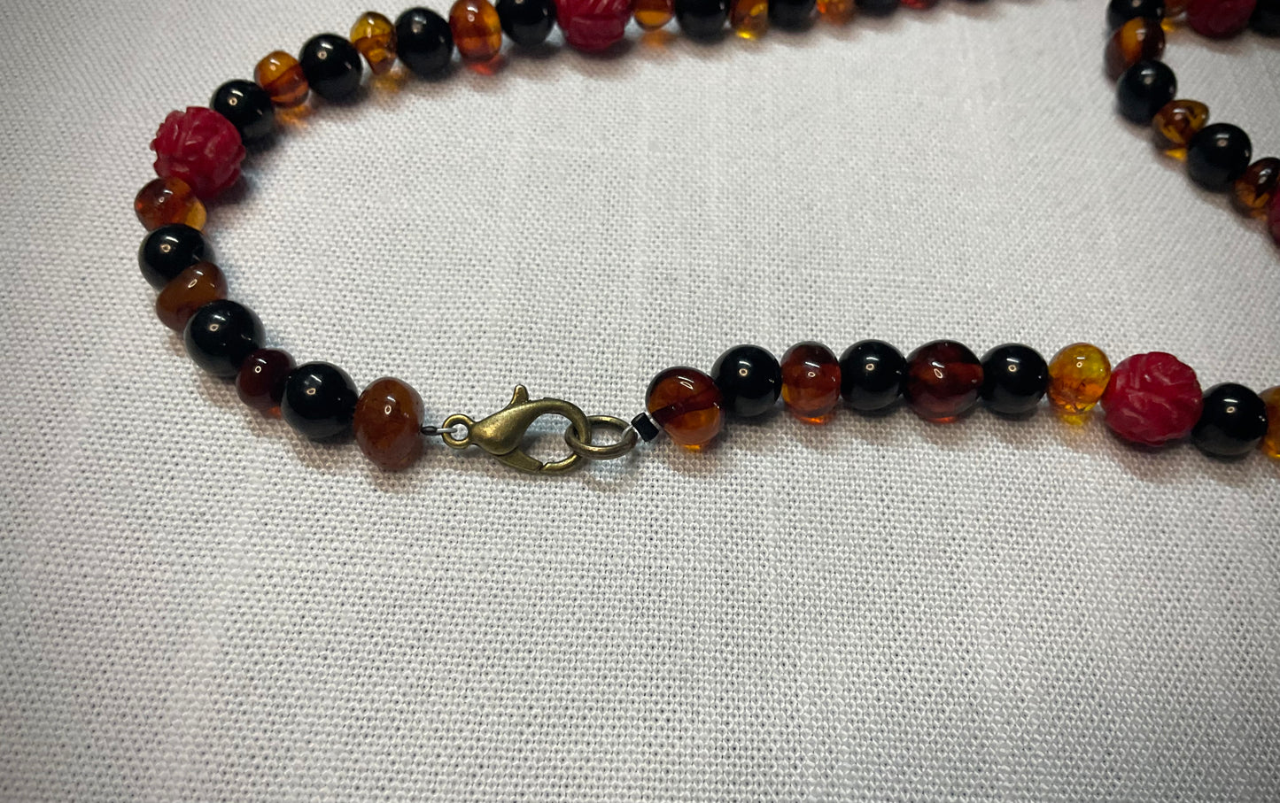 Lord Ganesha Amber Jet and Red Coral Talisman