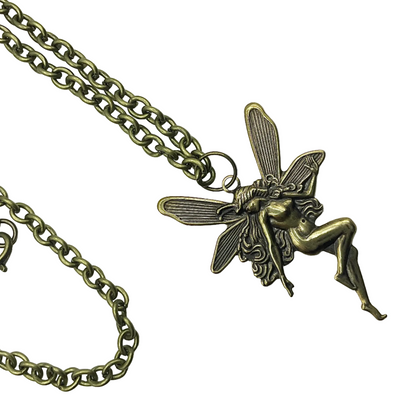 Bronze tone fairy pendant on a chain against a white background