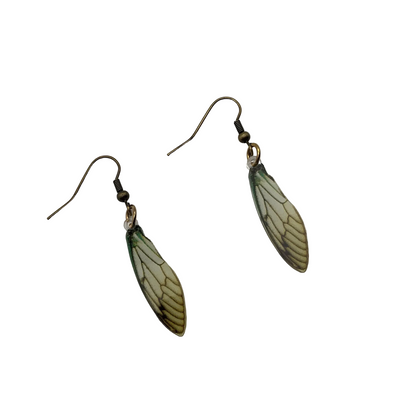 Pair of green and yellow wing-shaped fairy wing earrings on a white background