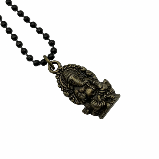 Lord Ganesha Image Charm Necklace in bronze tone on a black ball chain shown against a while background