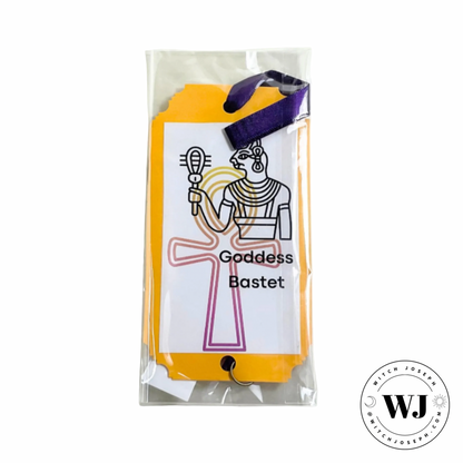Packaged prayer tag  product with illustration of Goddess Bastet on a white background