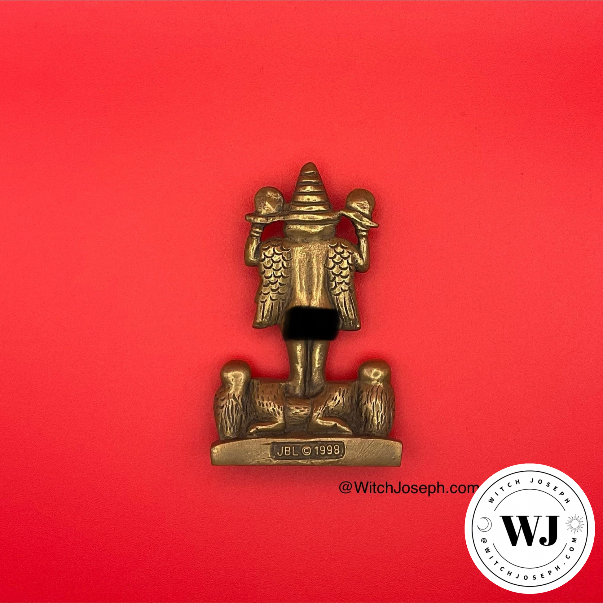 Bronze figurine of Lilith seen from the opposite side displayed on a red background with 'Witch Joseph' branding.