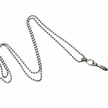 Silver tone chain with silver tone Goddess with spiral necklace on a white background