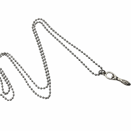 Silver tone chain with silver tone Goddess with spiral necklace on a white background