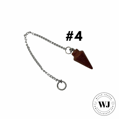 Goldstone pendulum on a chain with '#4' and 'WJ' logo on a white background