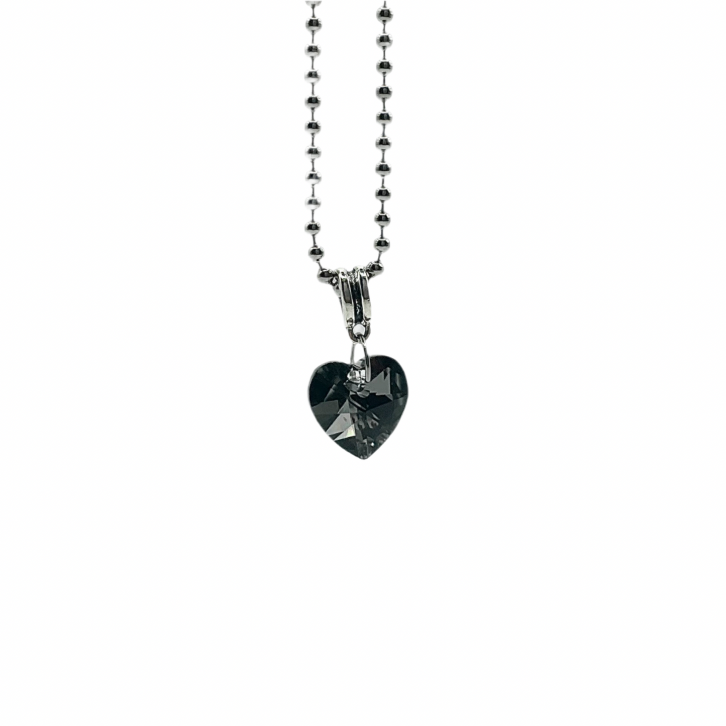Charm Necklace with a heart-shaped sparkling gray crystal pendant on a white background