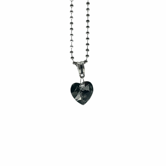 Charm Necklace with a heart-shaped sparkling gray crystal pendant on a white background