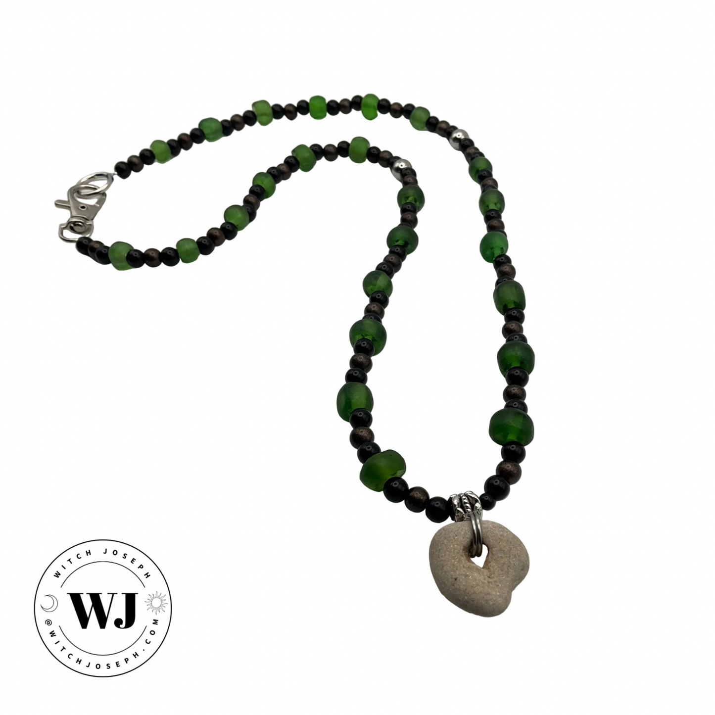 Necklace with green and black beads and a round Holey stone pendant on a white background, featuring the brand 'WJ'.