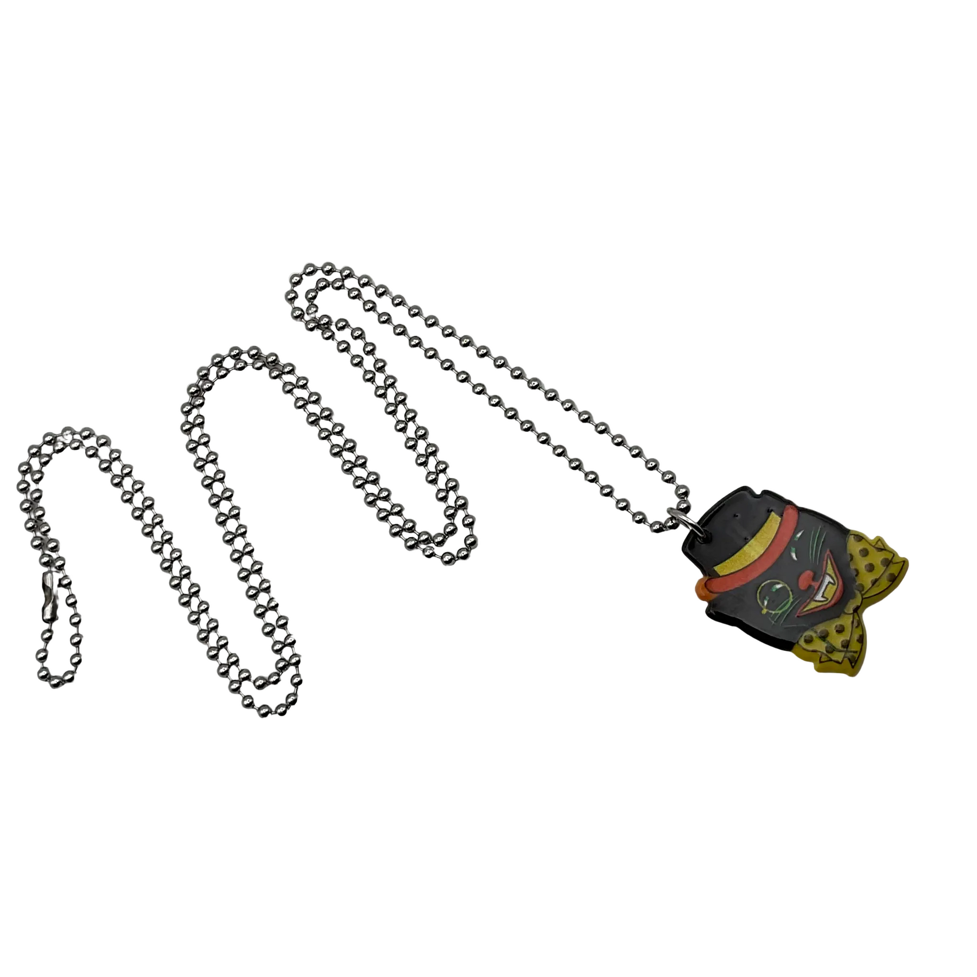 Necklace with a unique vintage style halloween cat in hat pendant on a silver tone ball chain against a white background