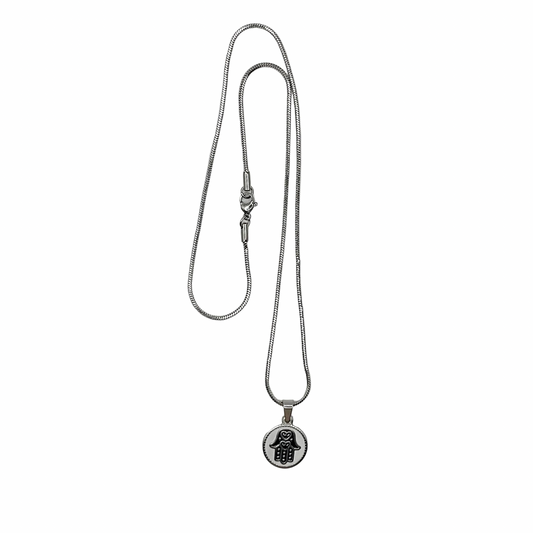 Silver tone necklace with a Hamsa hand pendant on a white background