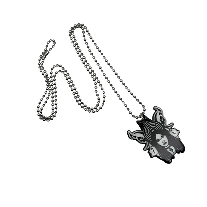 Necklace with a pendant featuring a stylized triple face Hekate design with Straphalos on a white background