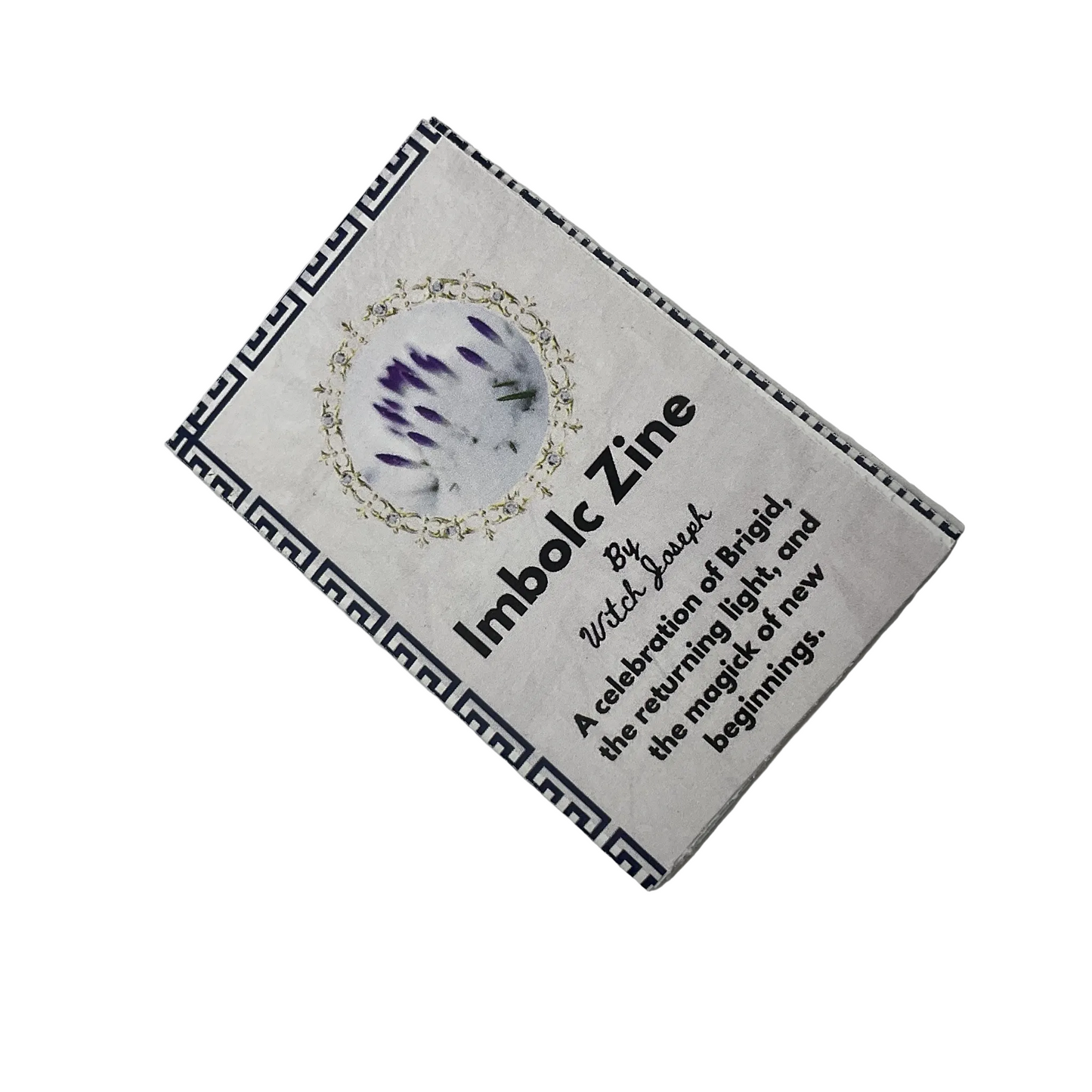 Zine titled 'Imbolc Zine' with decorative elements on a white background