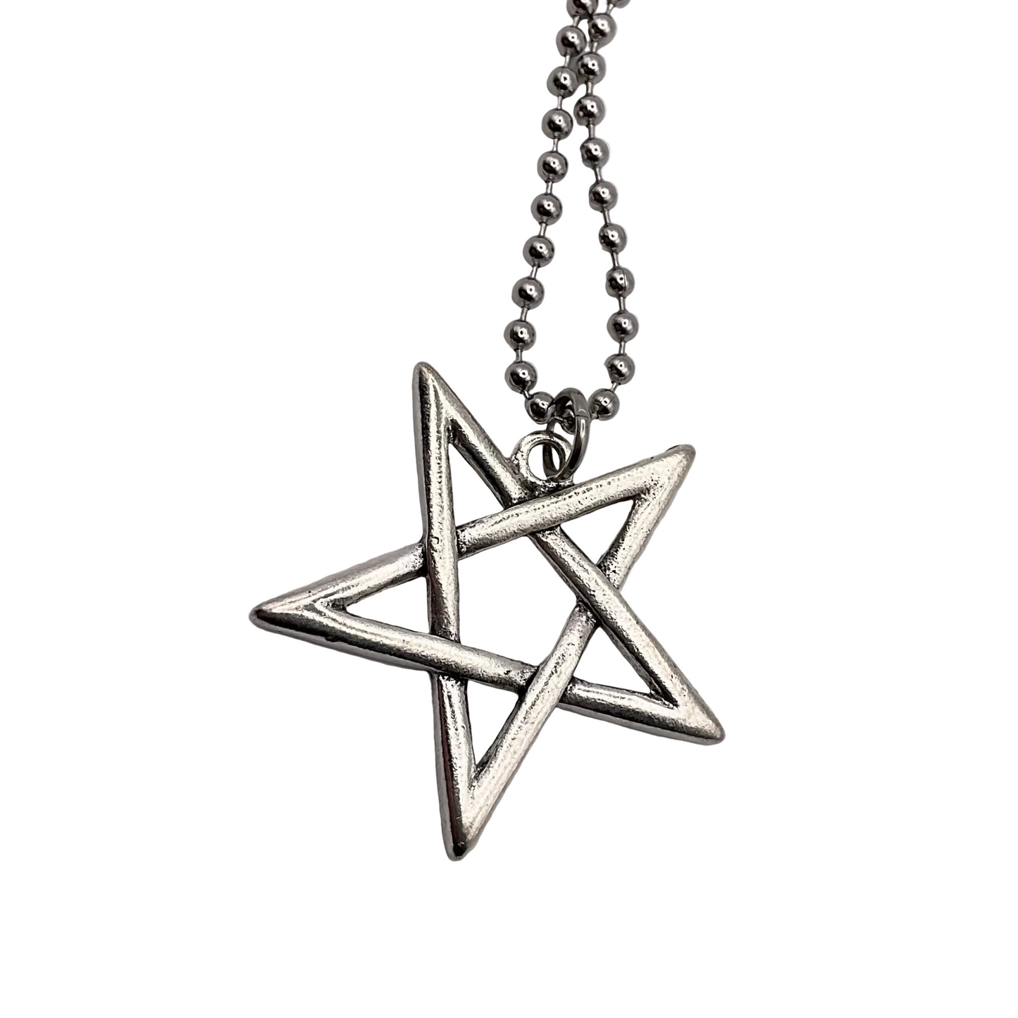 Silver star-shaped inverted Pentagram pendant on a chain against a white background