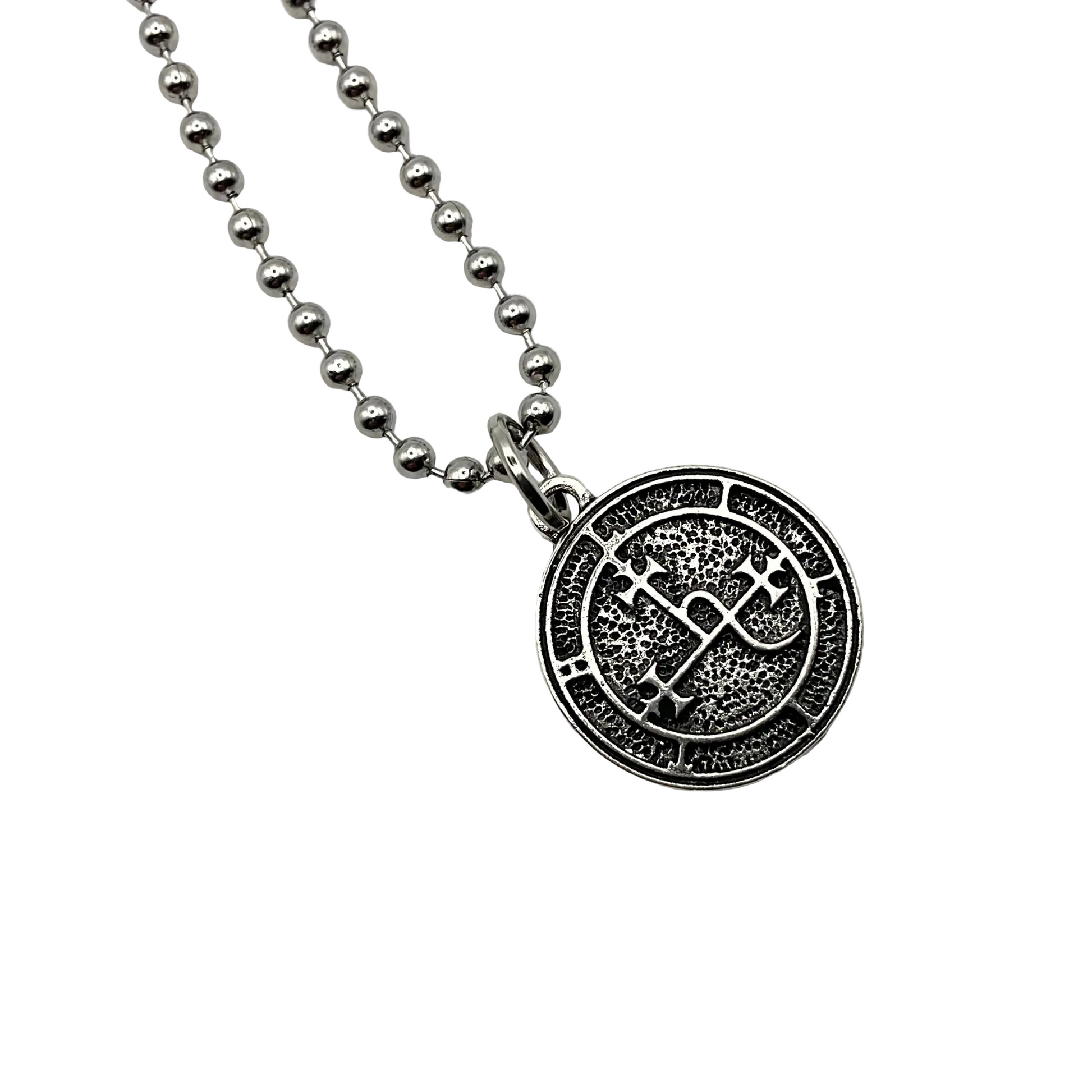 Silver ball chain charm necklace with a round silver tone Lilith seal pendant on a white background.