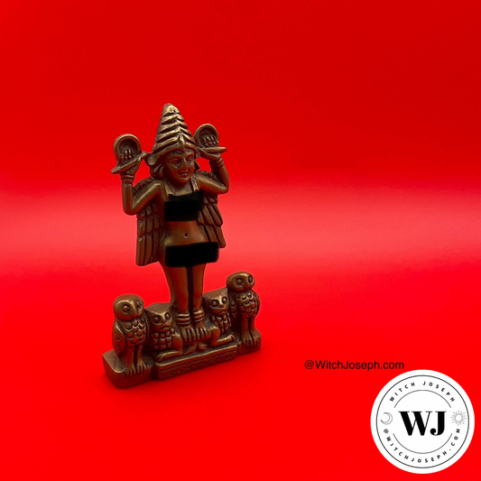 Bronze figurine of Lilith with owls on a red background, featuring the brand 'WJ'.