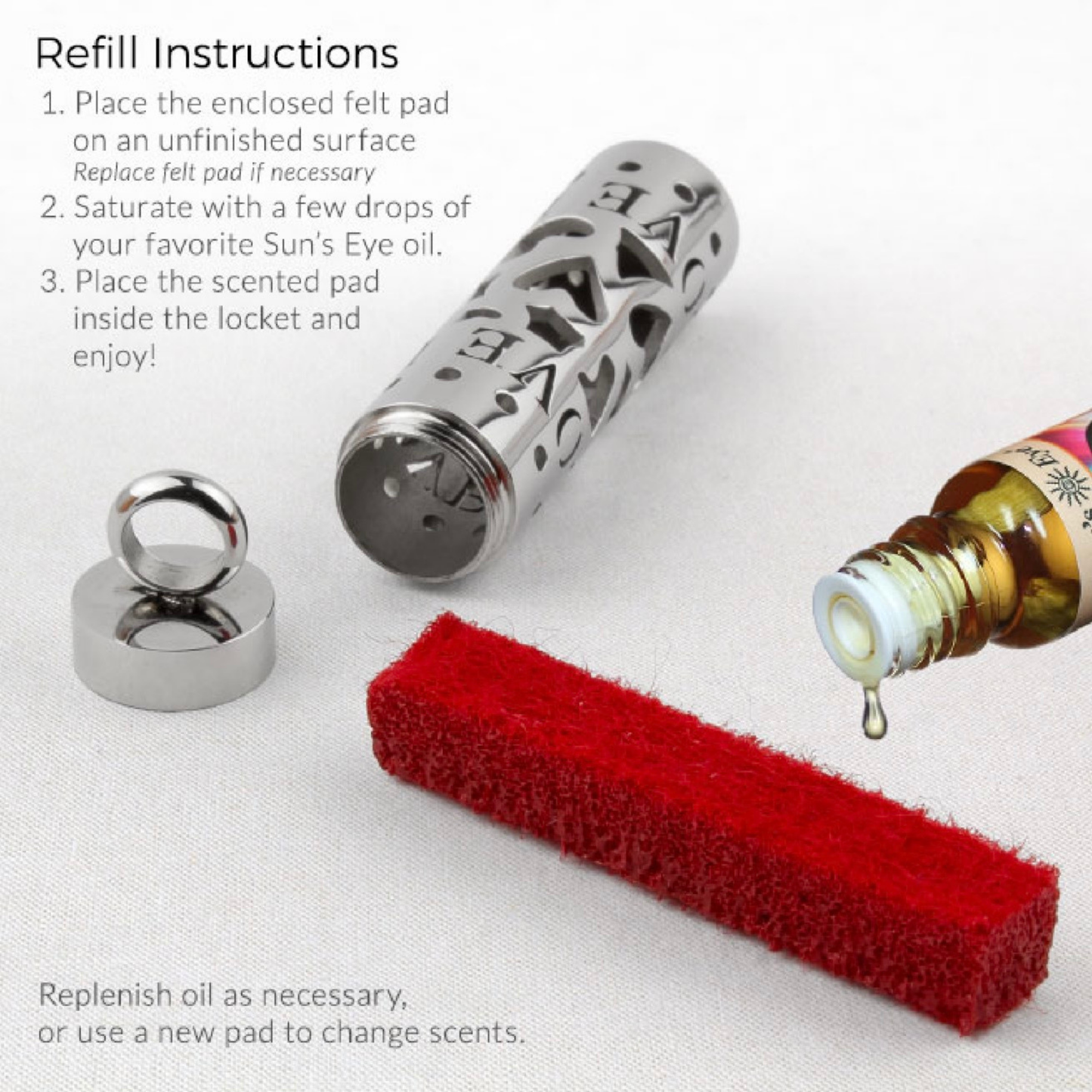 A photo showing the suns eye Pendulum Love oil diffuser locket being loaded with fragrance oil.