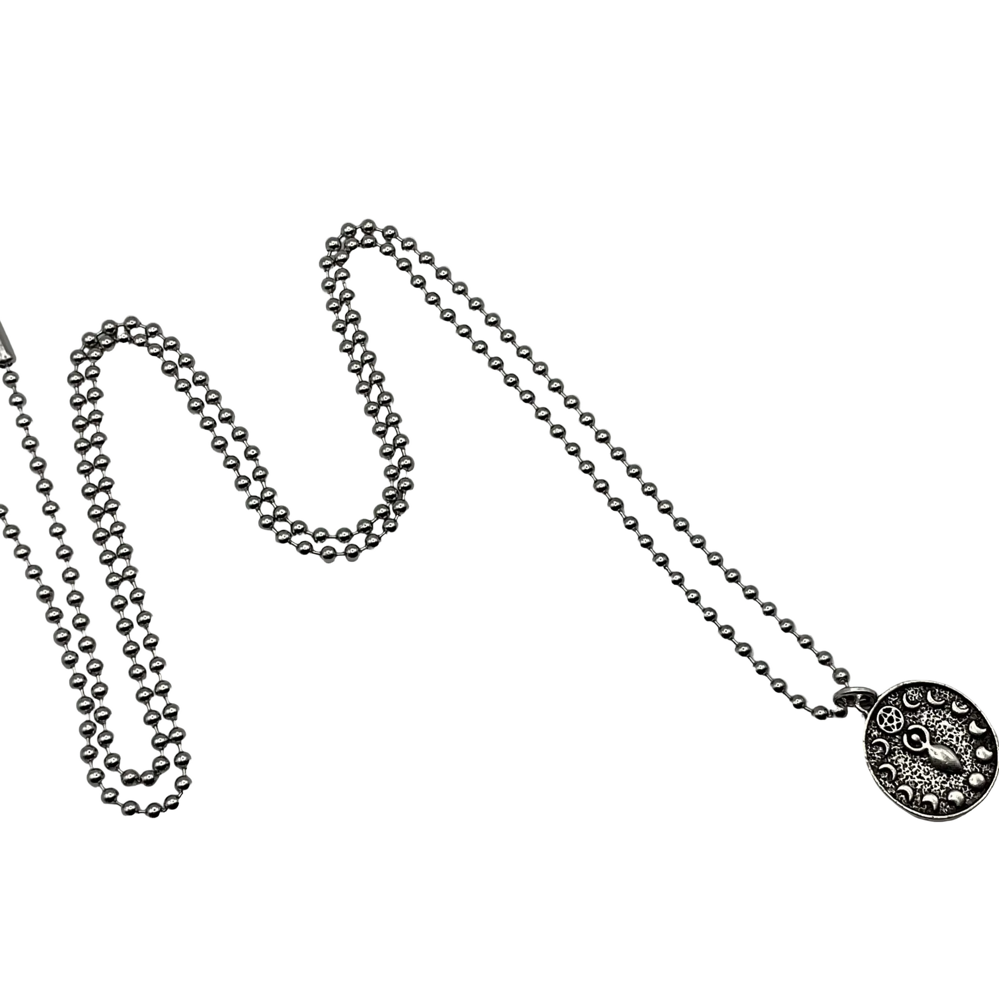 Silver tone ball chain necklace with a decorative Goddess pendant with Moon phases on a white background