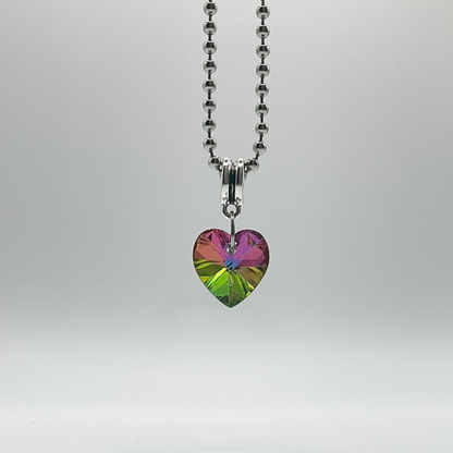 Ball chain charm Necklace with a heart-shaped, multicolored crystal pendant on a white background