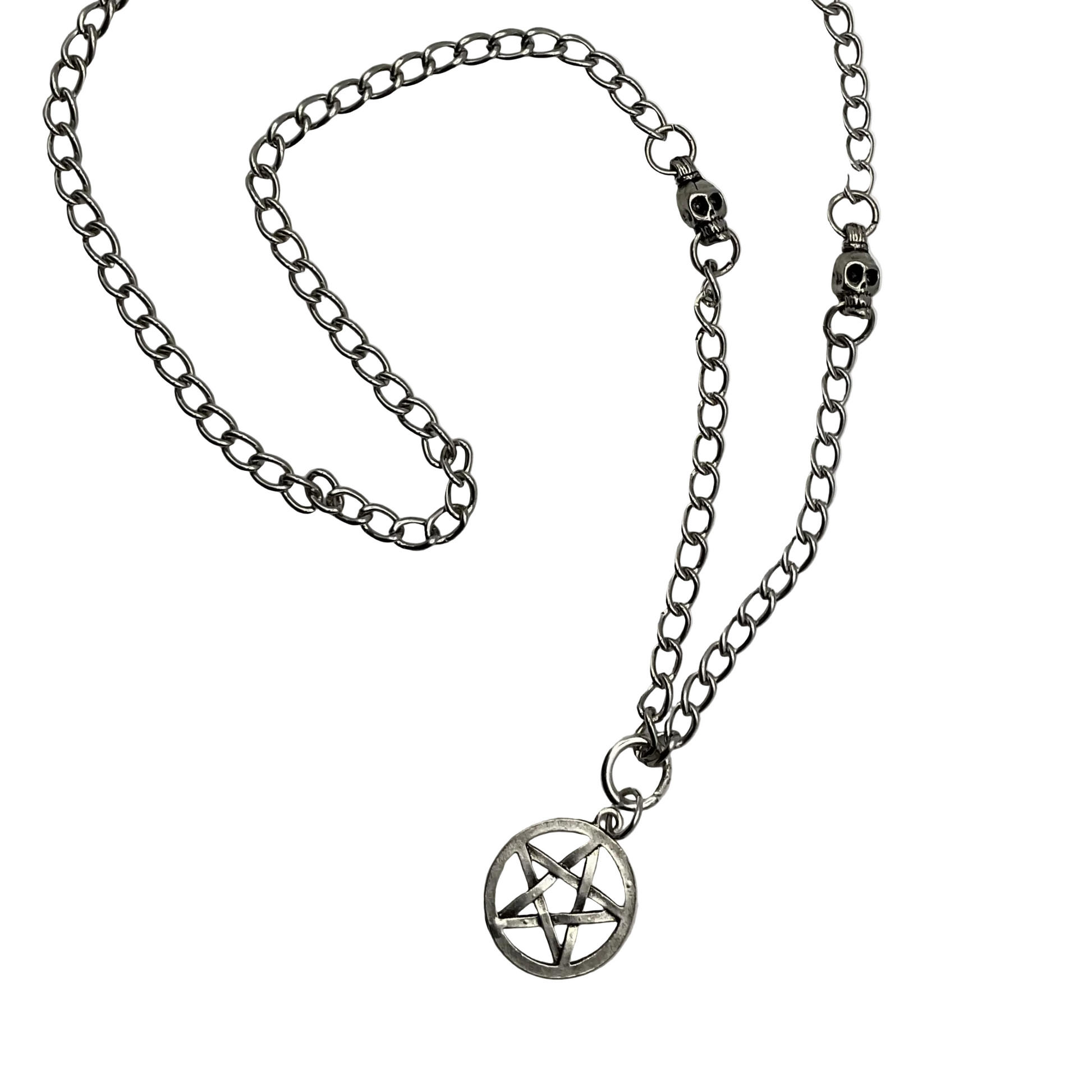 Silver tone chain necklace with a pentagram pendant with silver tone skull bead accents on a white background