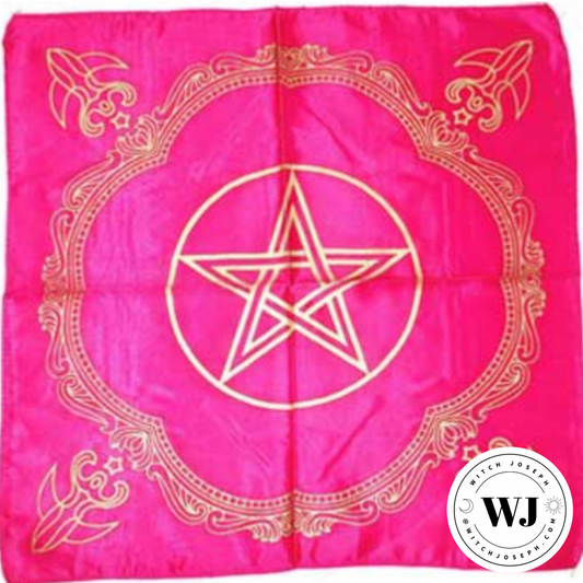 Pink cloth with gold pentagram design and 'WJ' logo in the corner