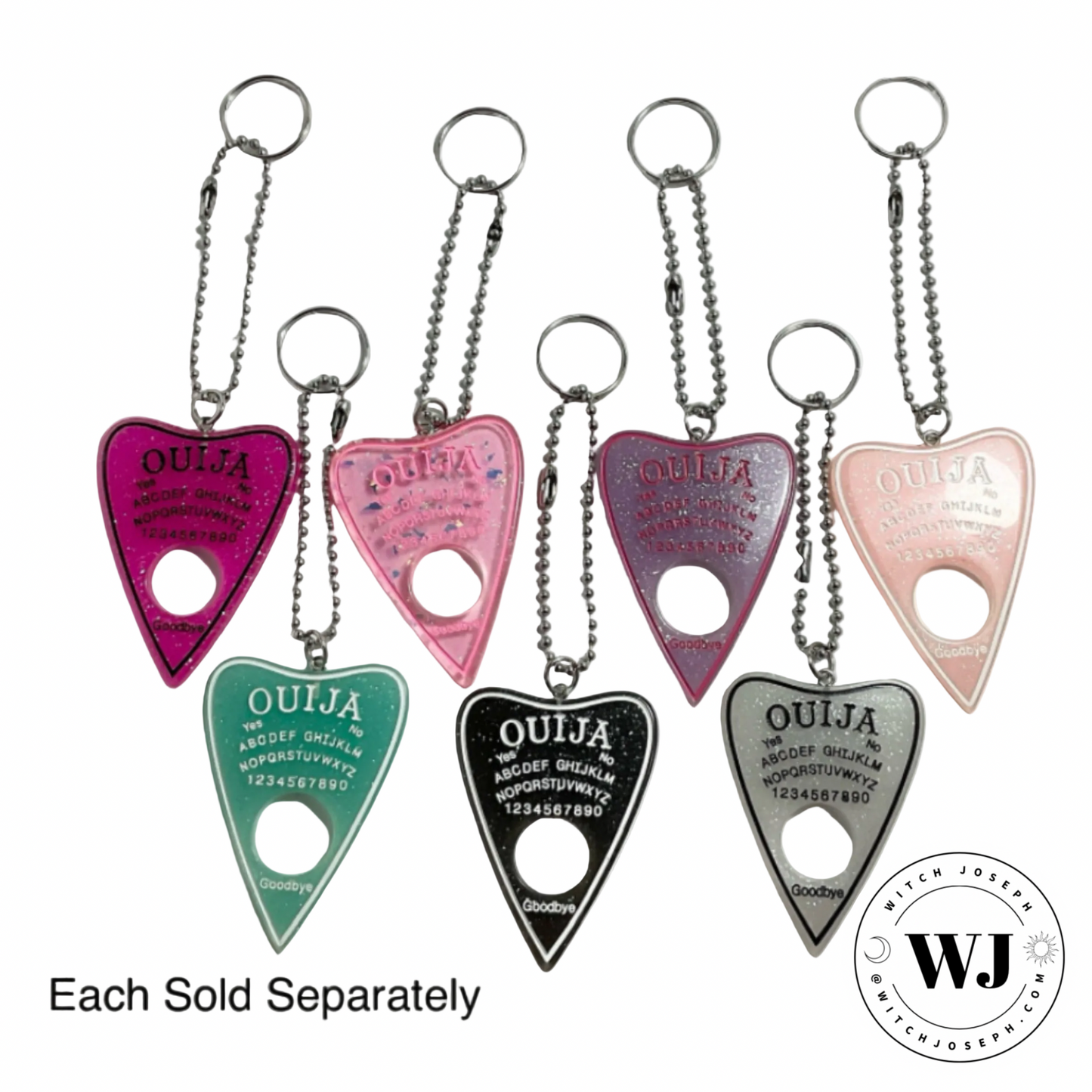 Set of colorful Ouija board planchette keychains displayed with WJ branding on a white background…each sold separately