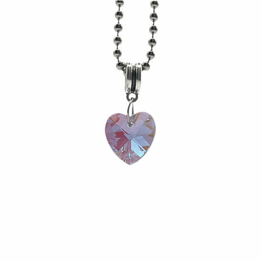 Heart-shaped purple tinted sparkling crystal pendant on a metal ball chain chain against a white background