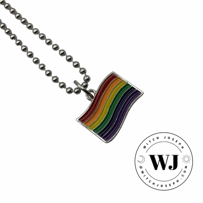 Rainbow flag pendant on a ball chain displayed on a white background with 'Witch Joseph' logo