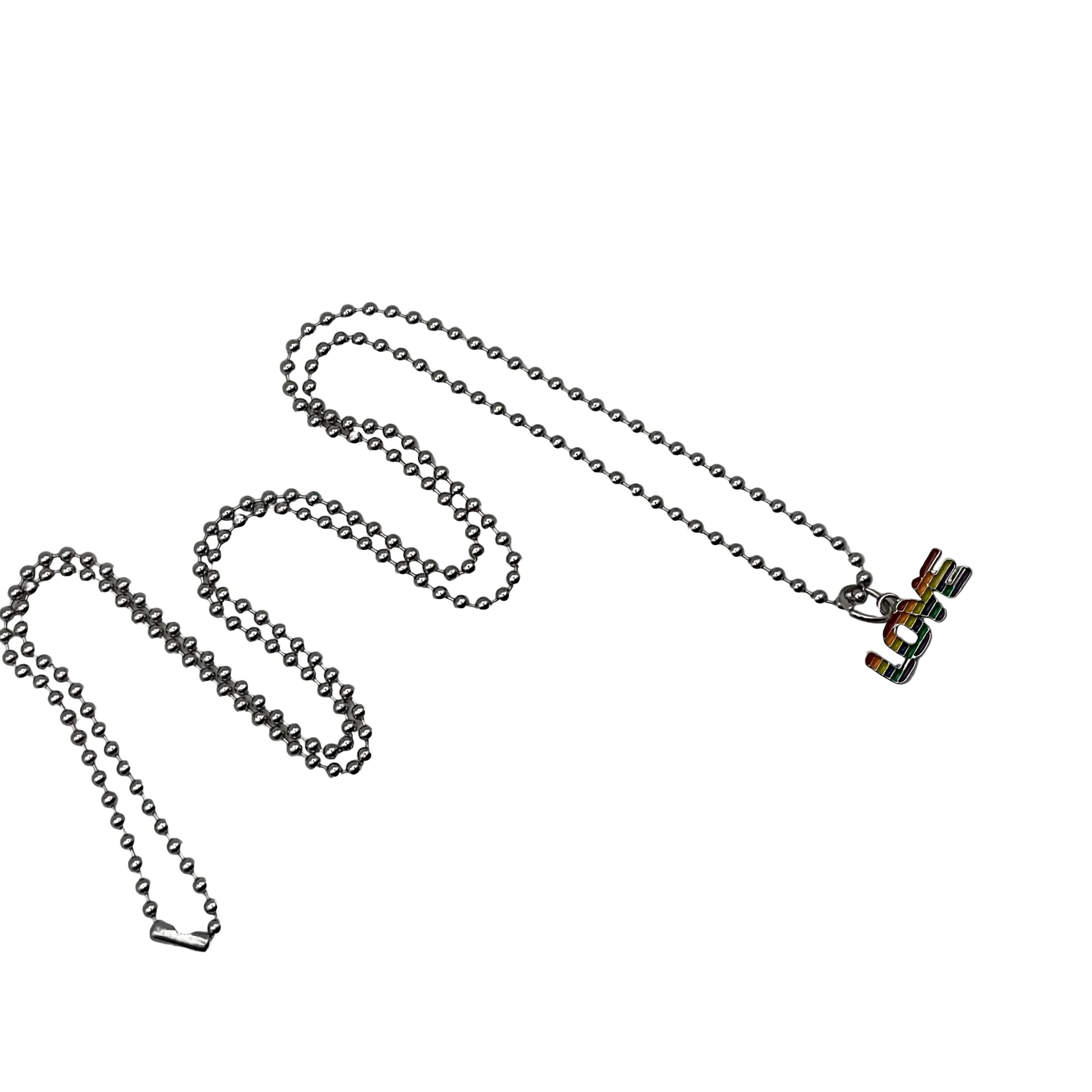 Metallic ball chain charm necklace with a rainbow Love pendant on a white  background