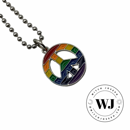Colorful rainbow peace symbol pendant on a ball chain displayed against a white background with 'Witch Joseph' logo