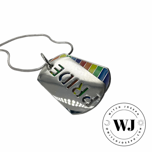 Colorful rainbow pendant with 'PRIDE' cut out revealing the rainbow flag underneath…displayed on a white background, featuring the WJ logo