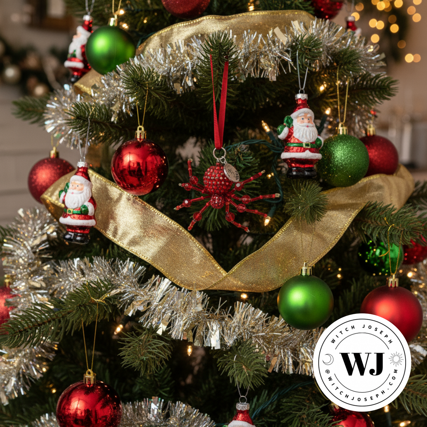 A red spider ornament hanging on a beautiful xmas tree…with the Witch Joseph logo