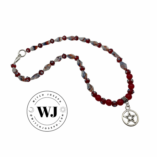 Beaded necklace with a pentagram charm on a white background, featuring the brand 'Witch Joseph'.