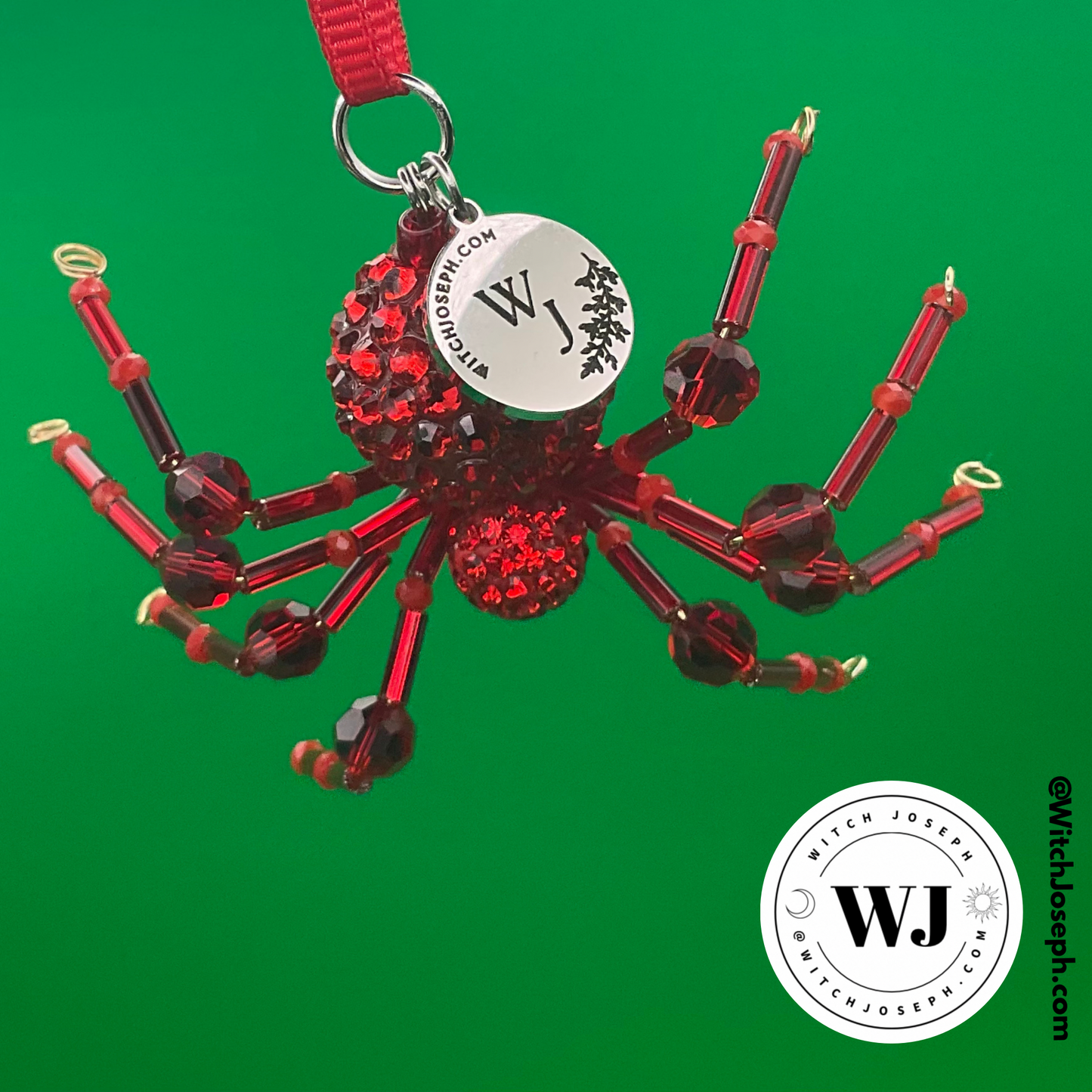 Red spider ornament on a green background with the Witch Joseph logo