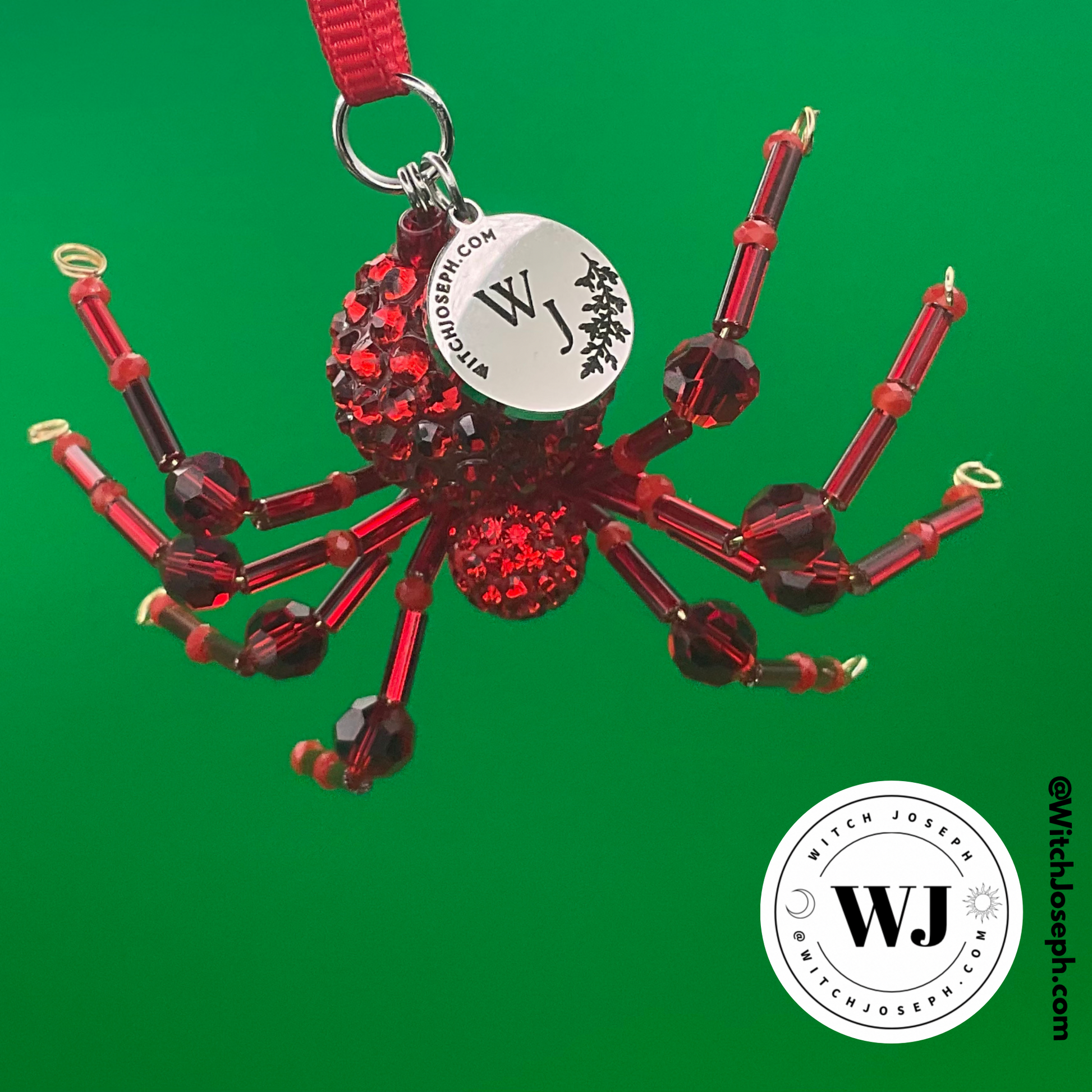 Red spider ornament on a green background with the Witch Joseph logo