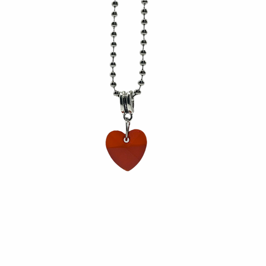 Ball chain charm Necklace with a red crystal heart pendant on a white background