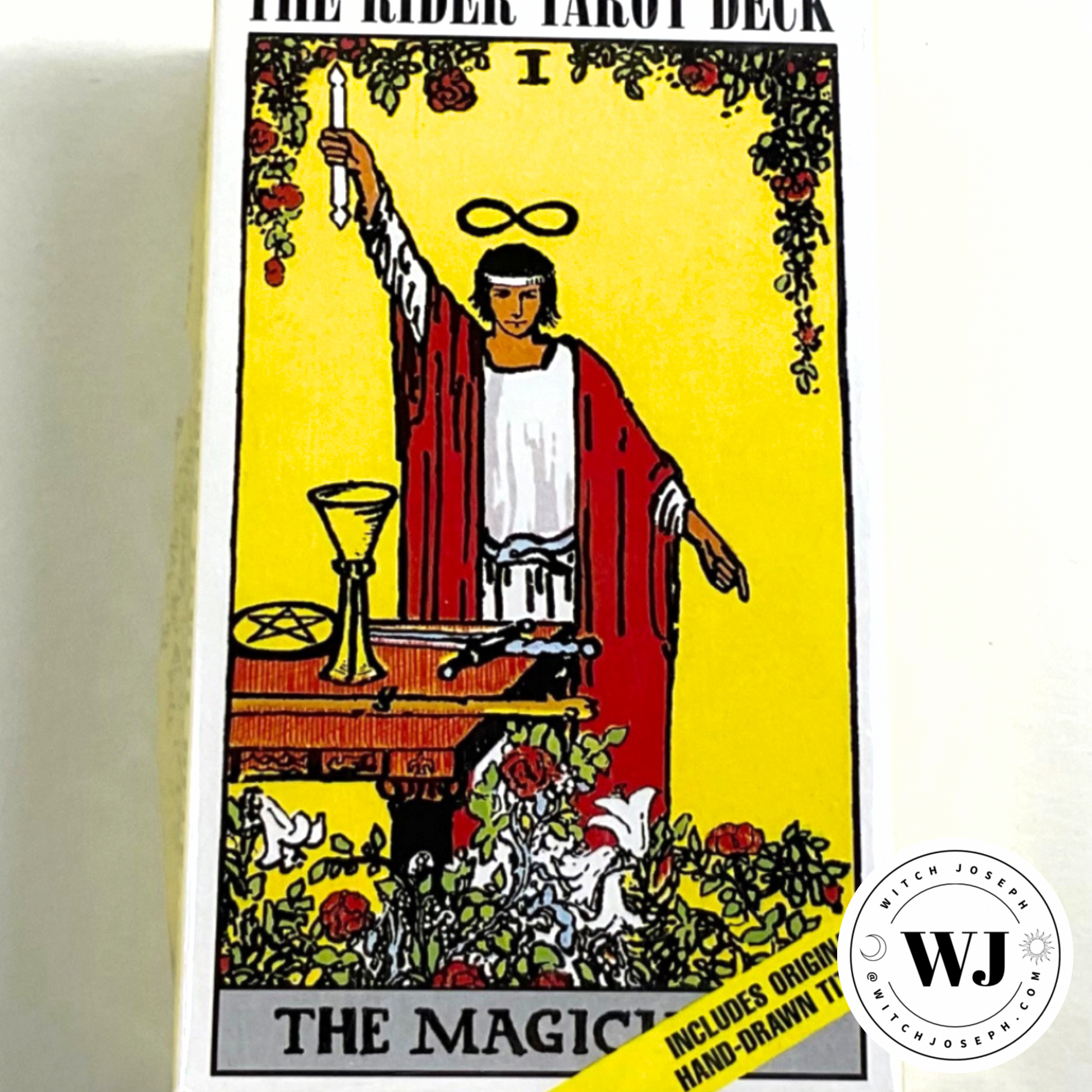 Card from The Rider Tarot Deck with a yellow background and intricate design displayed against a white background.