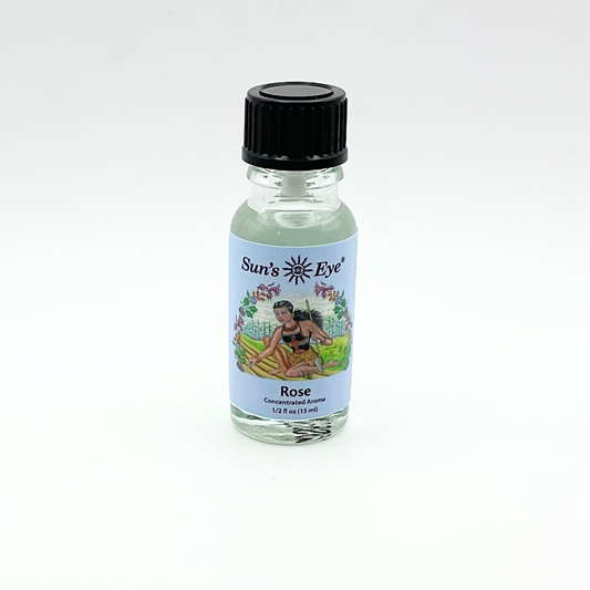 Small bottle of Sun's Eye Rose Oil on a white background
