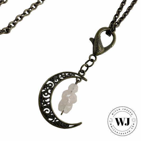 Necklace with moon-shaped pendant and rose quartz Goddess Bead displayed on a white background, featuring the brand 'Witch Joseph”