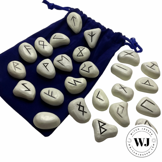 Set of stone runes with a blue drawstring bag on a white background, featuring the brand 'Witch Joseph'.