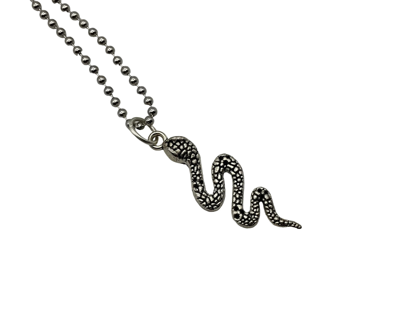 Snake-shaped pendant on a ball chain against a white background