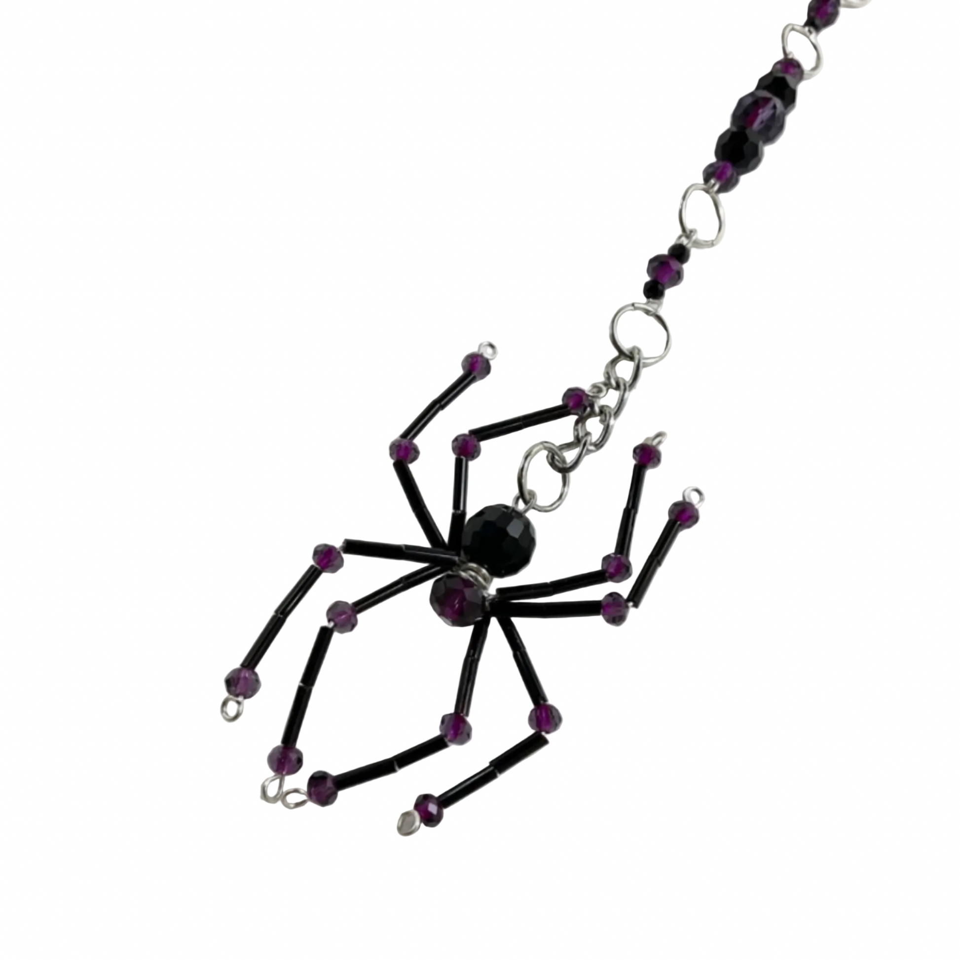 Spider-shaped sun catcher car charm black and purple beads displayed on a white background