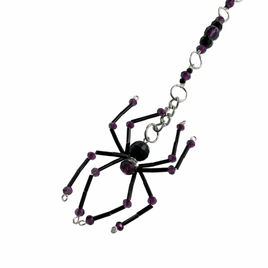 Spider-shaped sun catcher car charm black and purple beads displayed on a white background