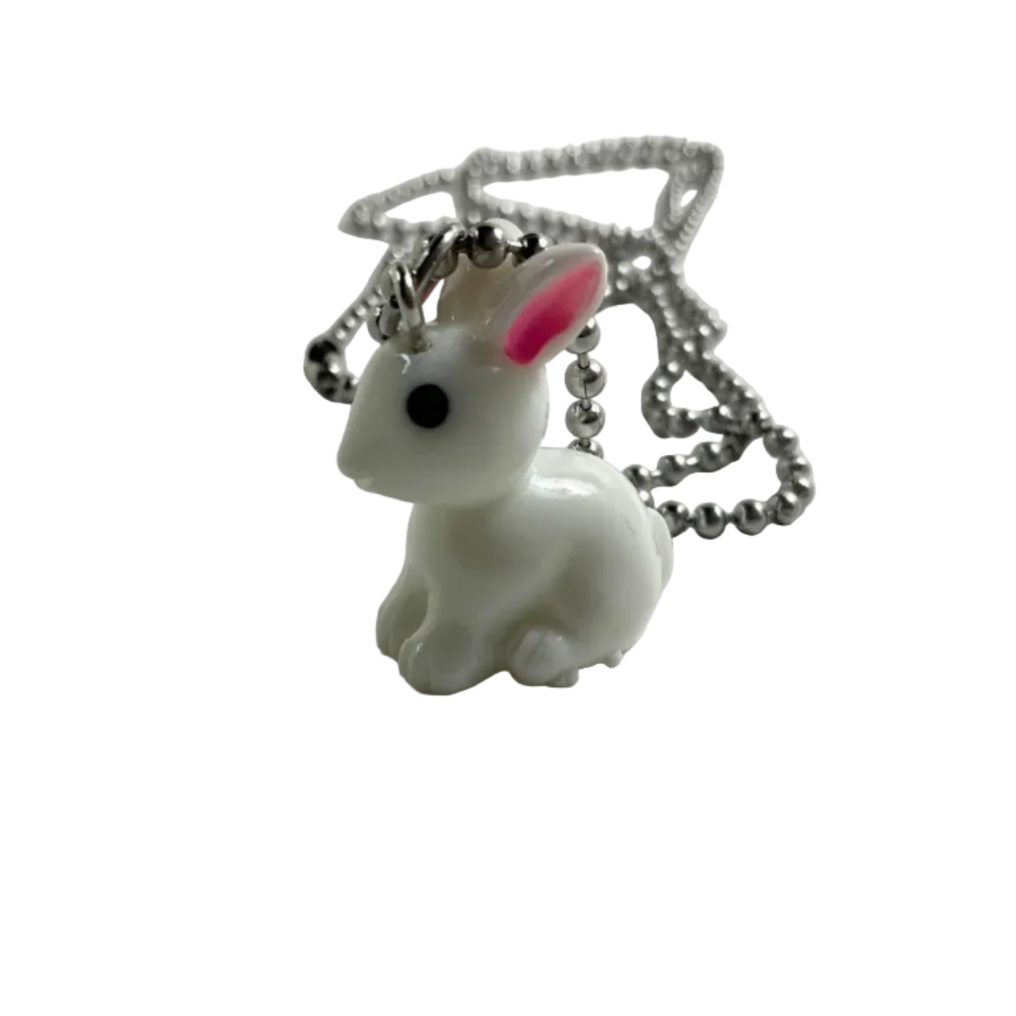 White rabbit-shaped pendant with pink inner ear on a ball chain displayed on a white background.