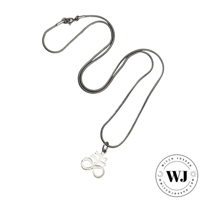 Silver tone necklace with an alchemical sulphur symbol pendant on a white background, featuring the brand 'WJ'.