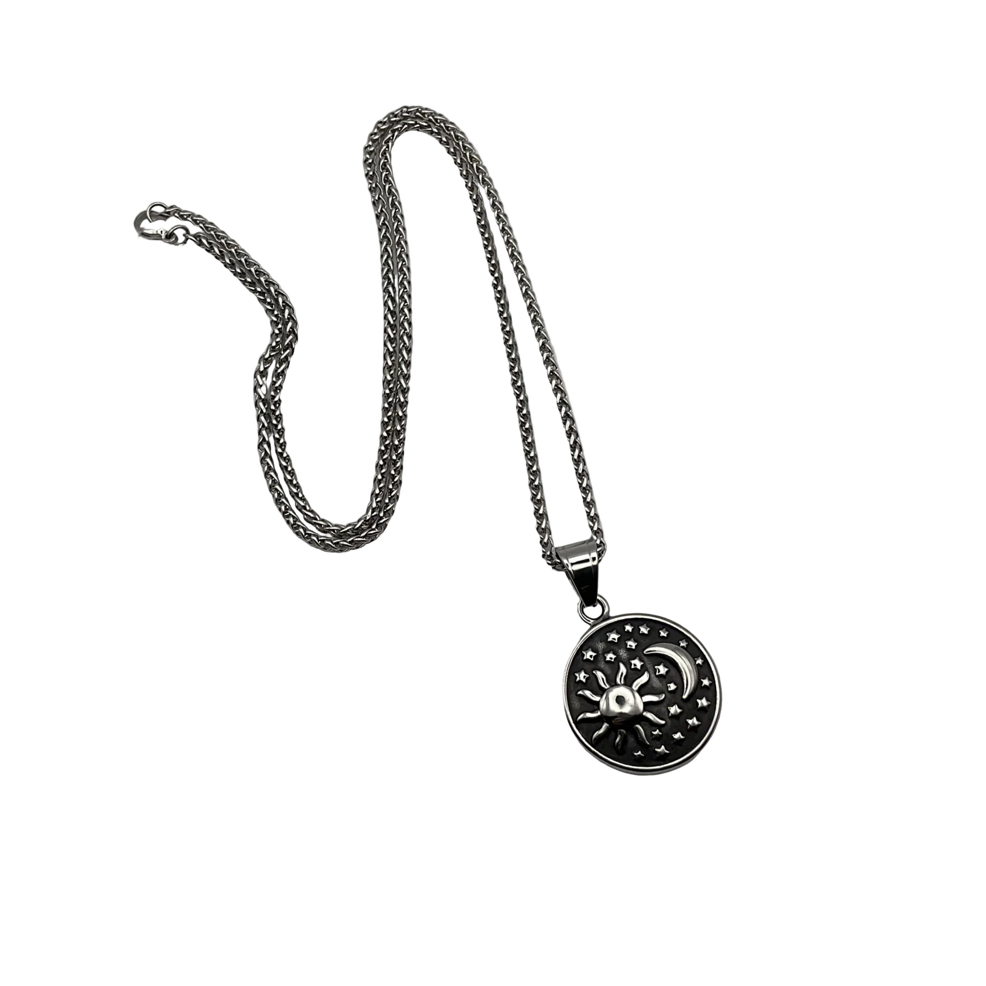 Stainless steel Necklace with a black and silver sun and moon pendant on a white background